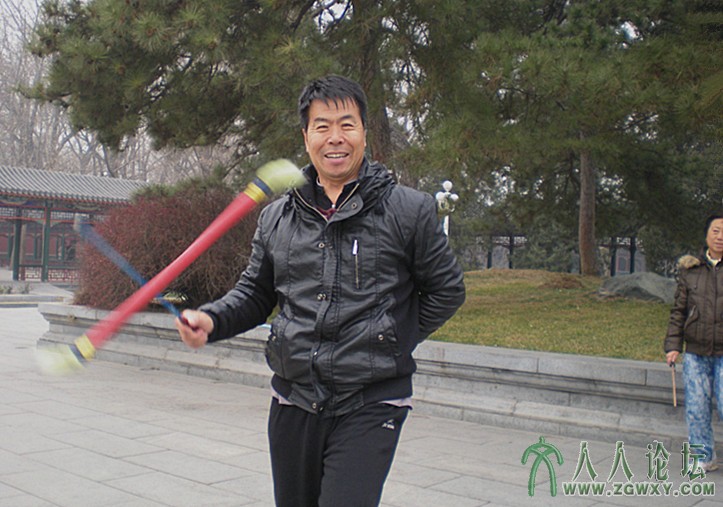 北京。打花棍 Colour-stick player.jpg